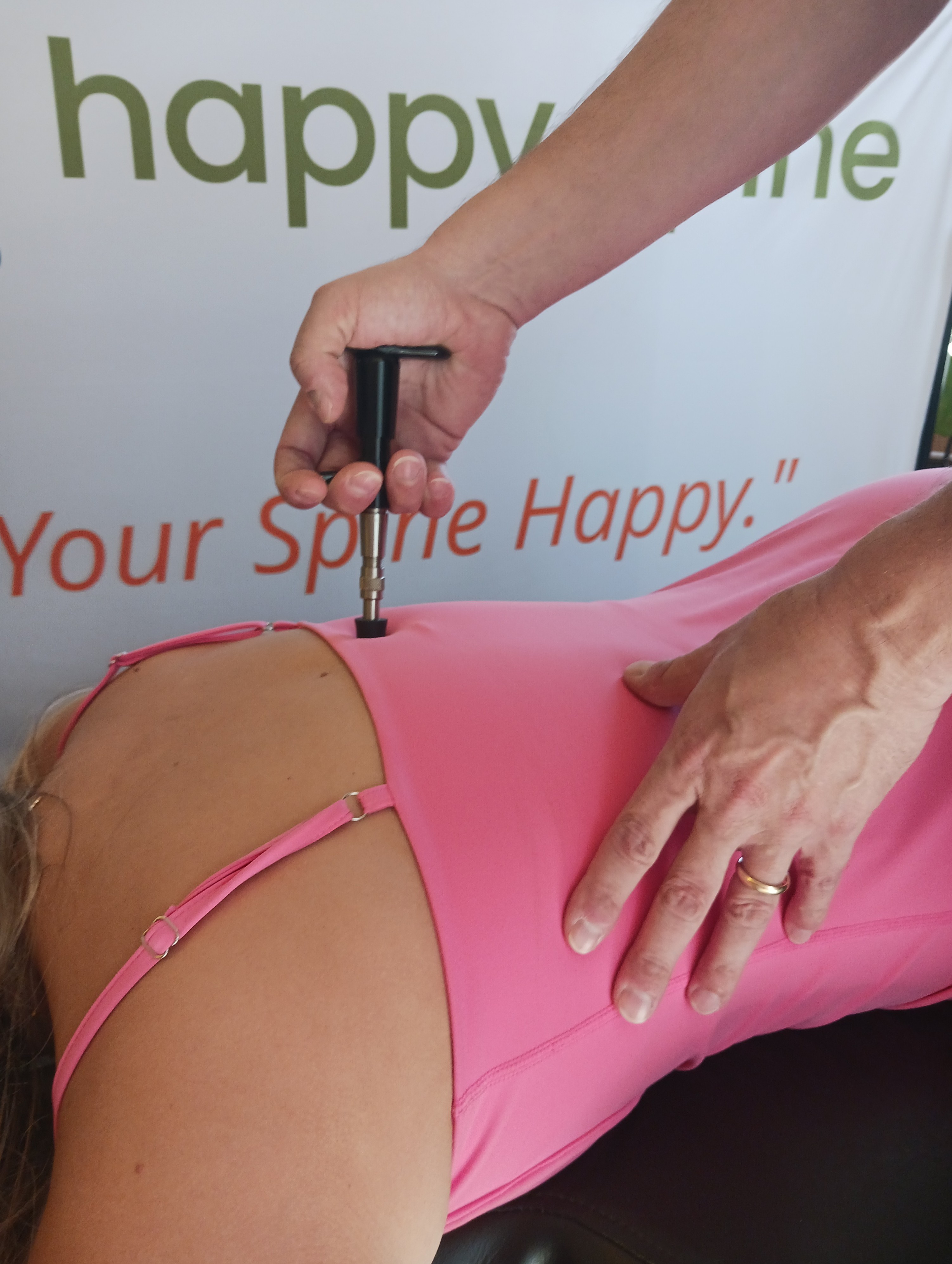 Dr. Bell adjusting a patient